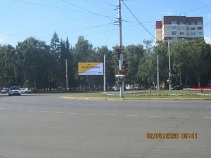 Худайбердина, (около кольца), напротив многоквартирного жилого дома № 99